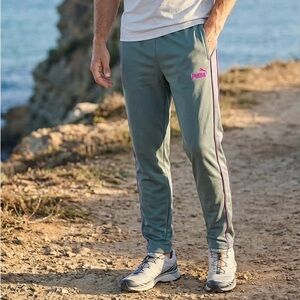 PUMA  Men's Green Joggers with Pink Logo. Size XS